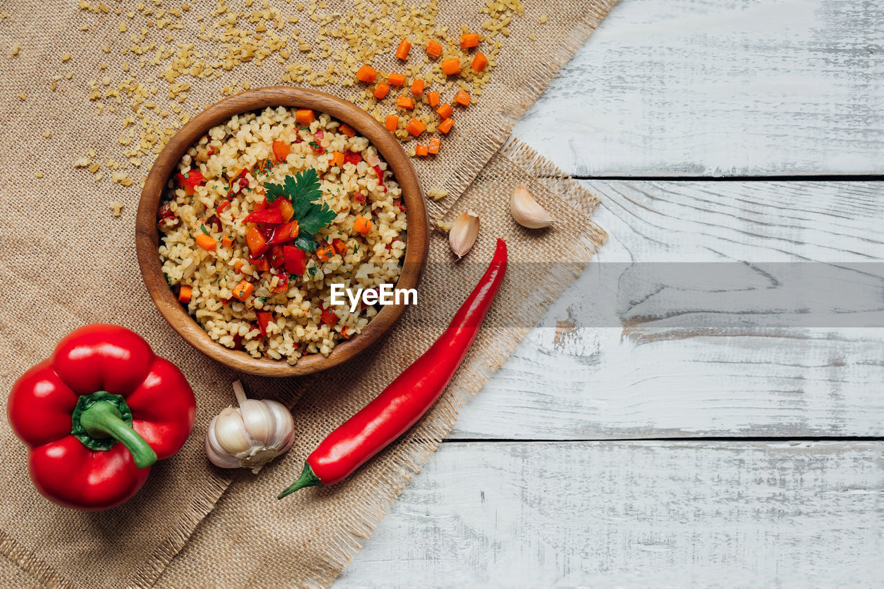 High angle view of breakfast over burlap on table