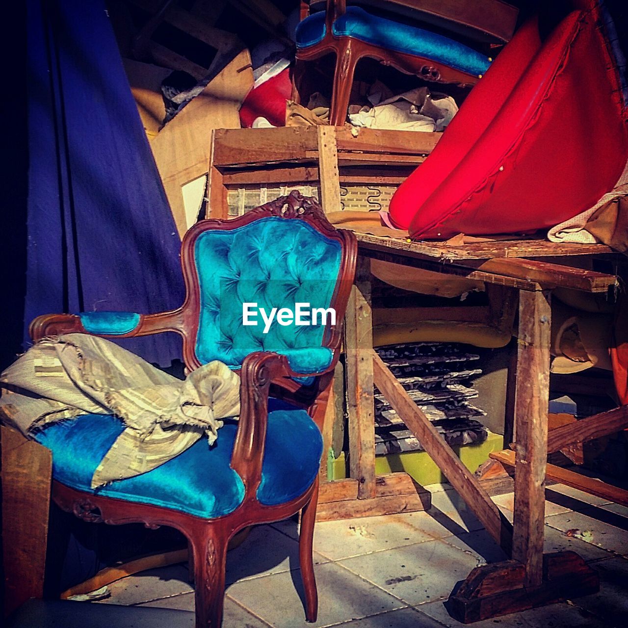 Interior of store room with velvet chairs