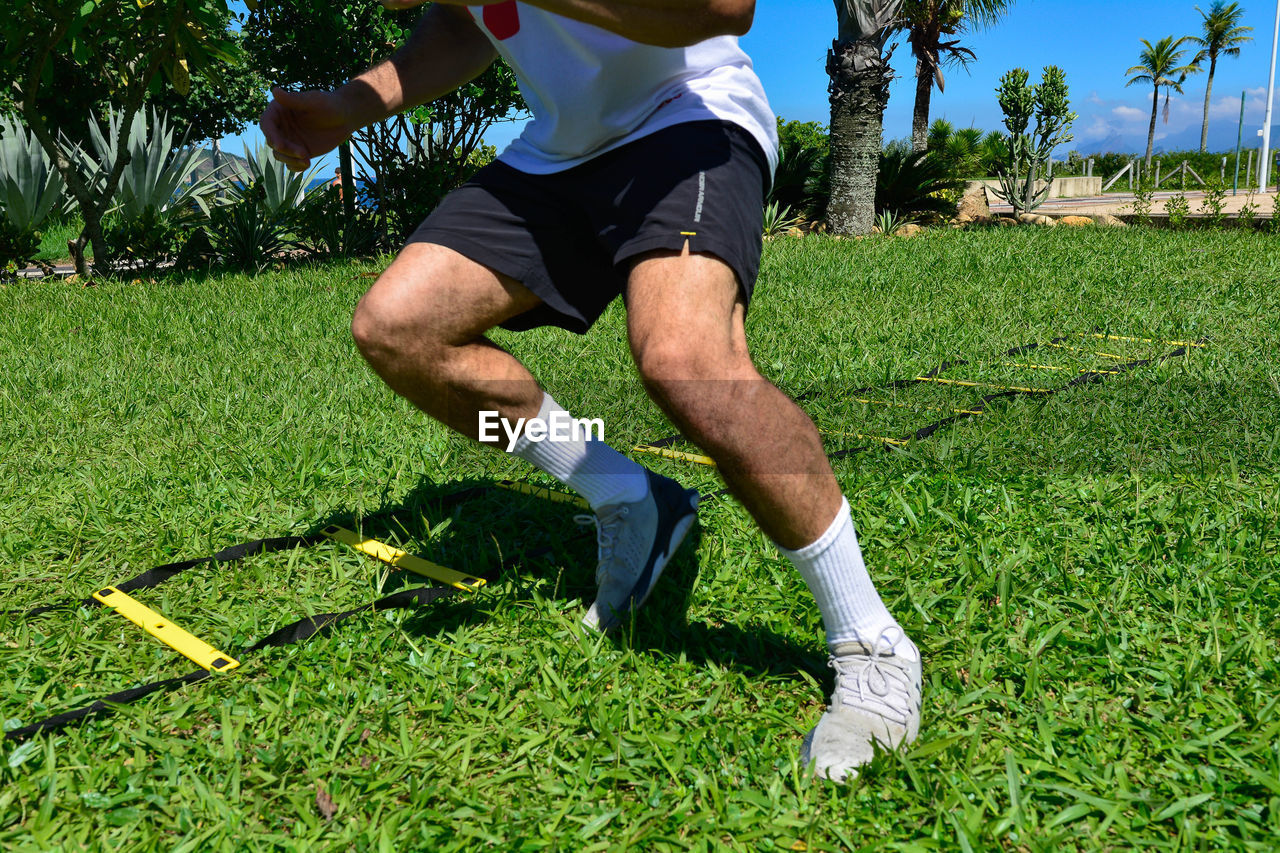 Low angle view of soccer player on field