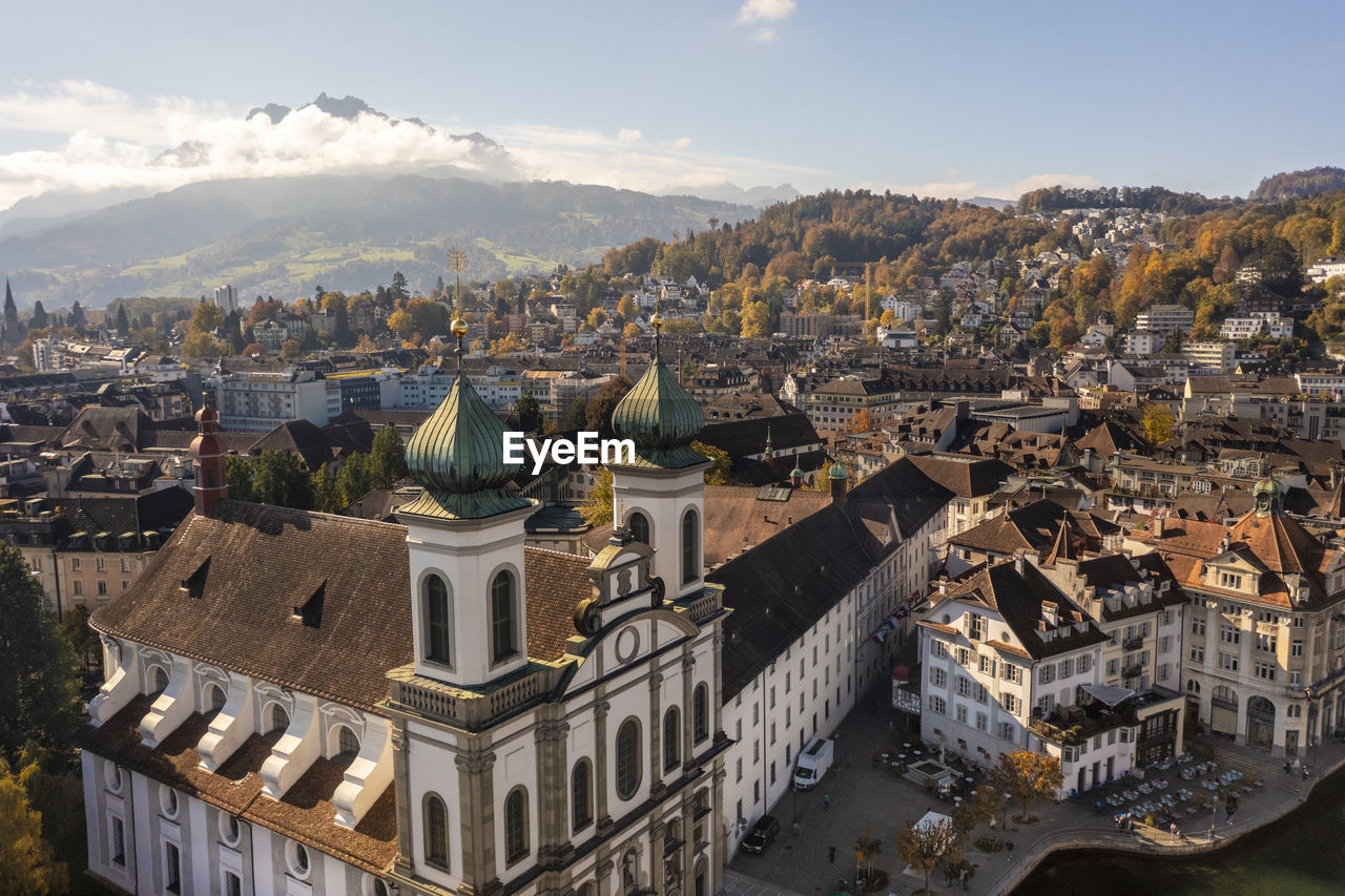 Switzerland, canton of lucerne, lucerne, aerial view of church of saint francis xavier in autumn