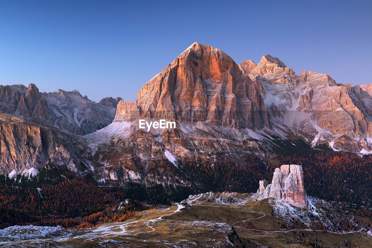 Rock formations on mountain against sky