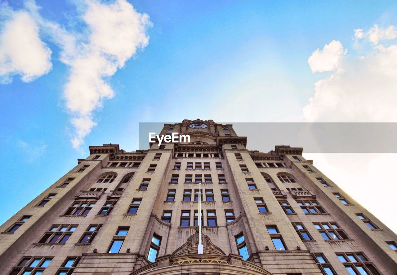 Low angle view of royal liver building against sky