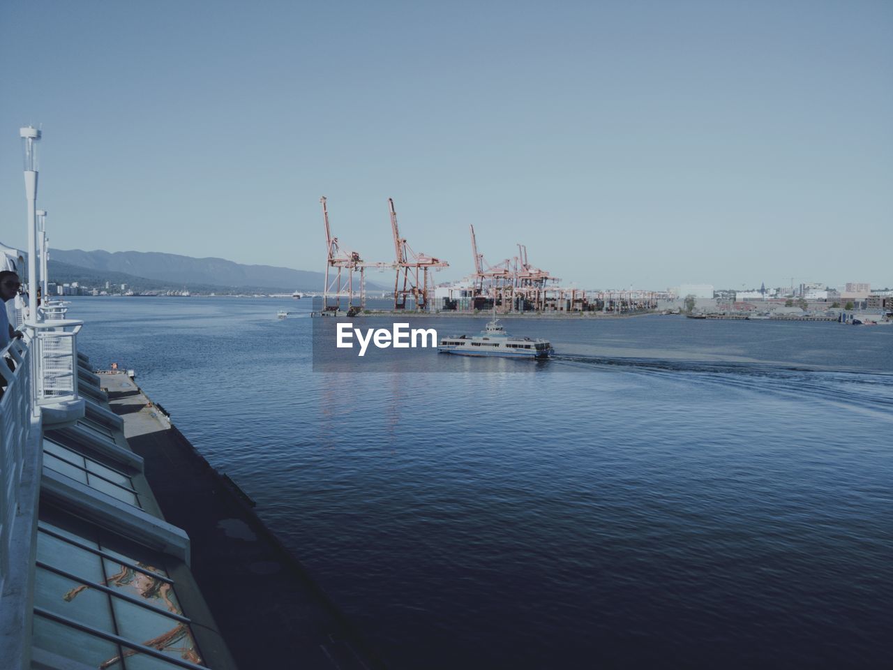 COMMERCIAL DOCK AGAINST CLEAR SKY