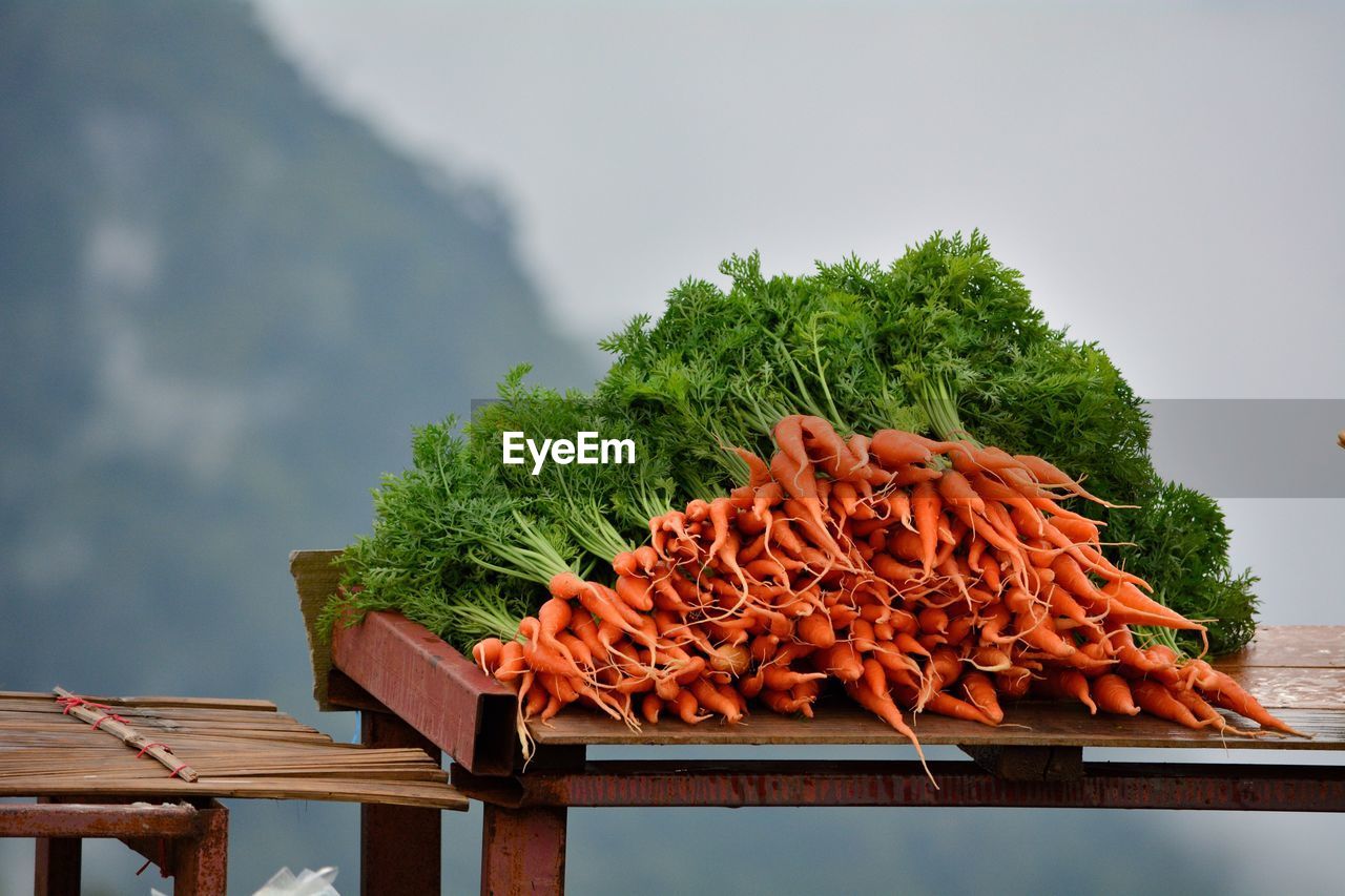 Close-up of food on table against sky