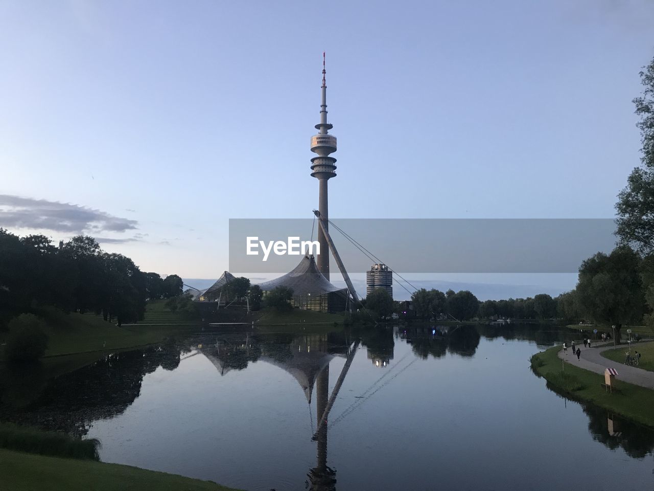 Reflection of communications tower in water