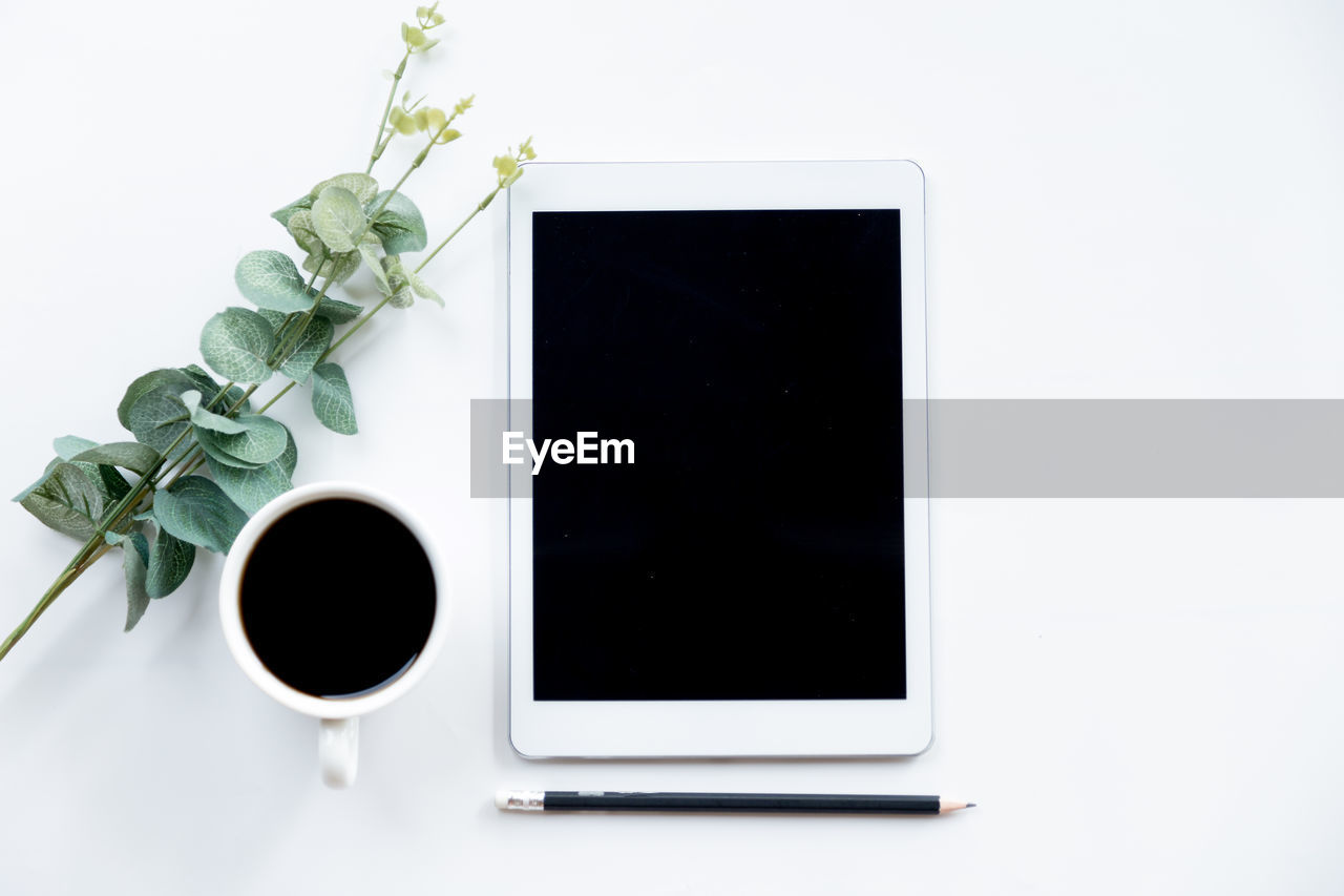 Flat lay, top view office table desk. workspace with blank, office supplies white background.