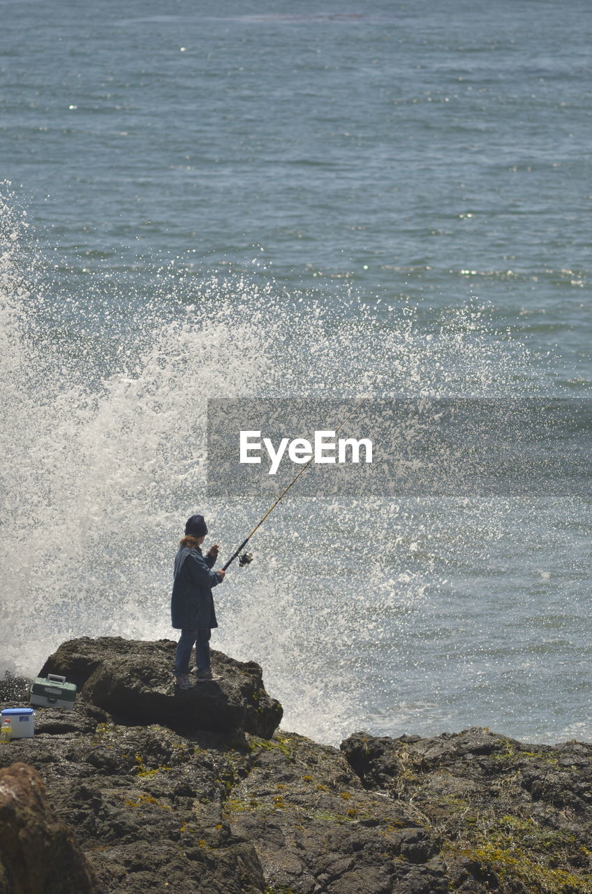 Man fishing at sea