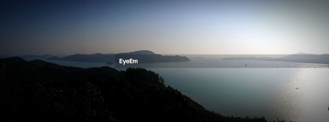 SCENIC VIEW OF MOUNTAINS AND RIVER