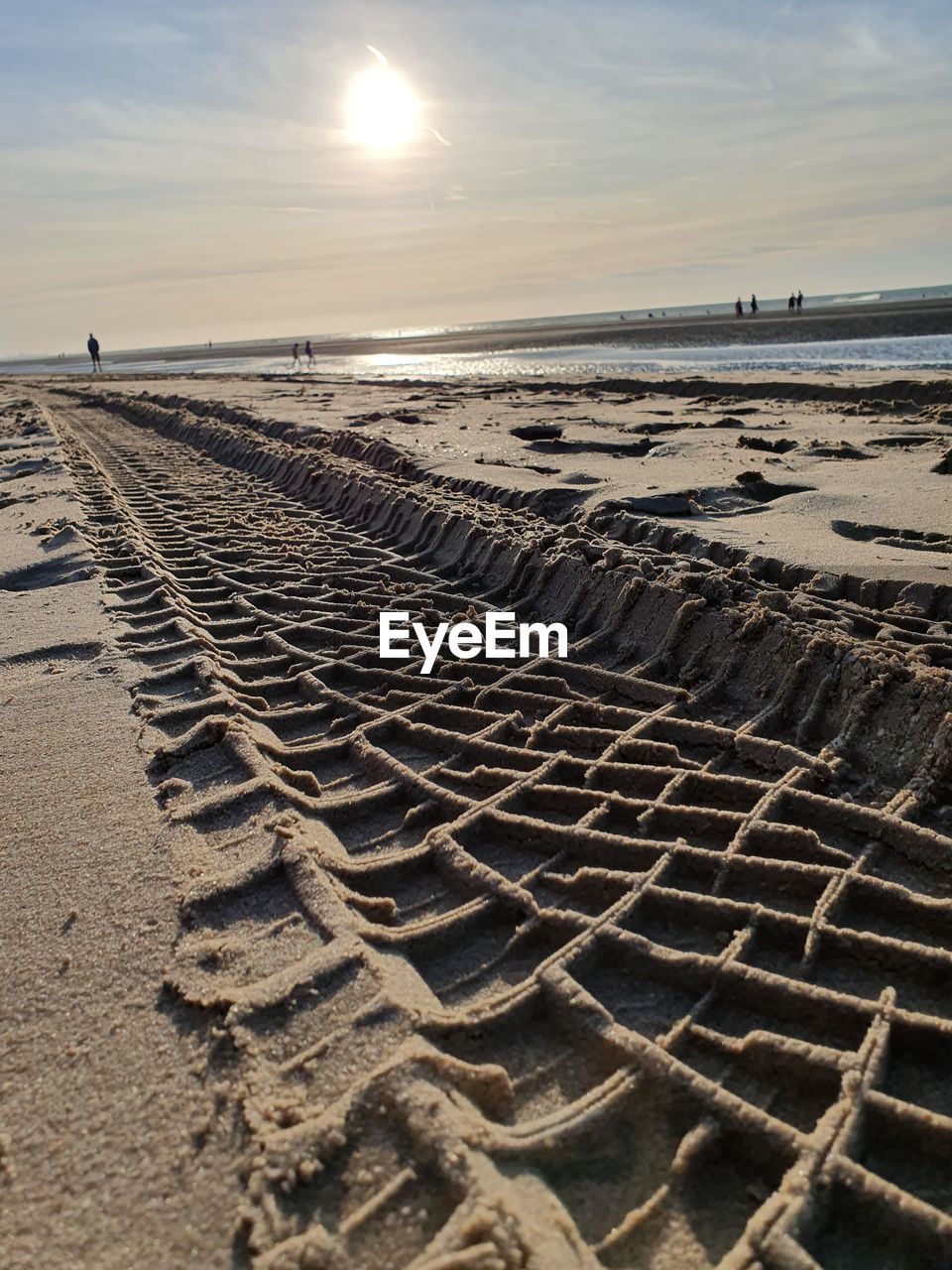 SCENIC VIEW OF BEACH DURING SUNSET