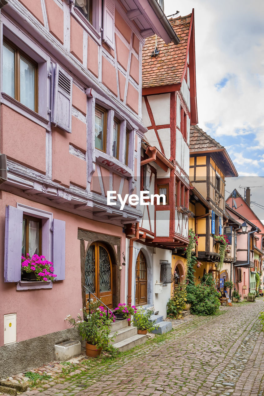 Picturesque historical street in eguisheim, alsace, france