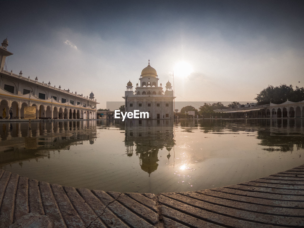 REFLECTION OF BUILDING IN WATER