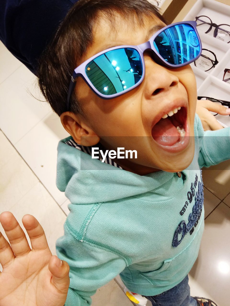 Boy wearing sunglasses