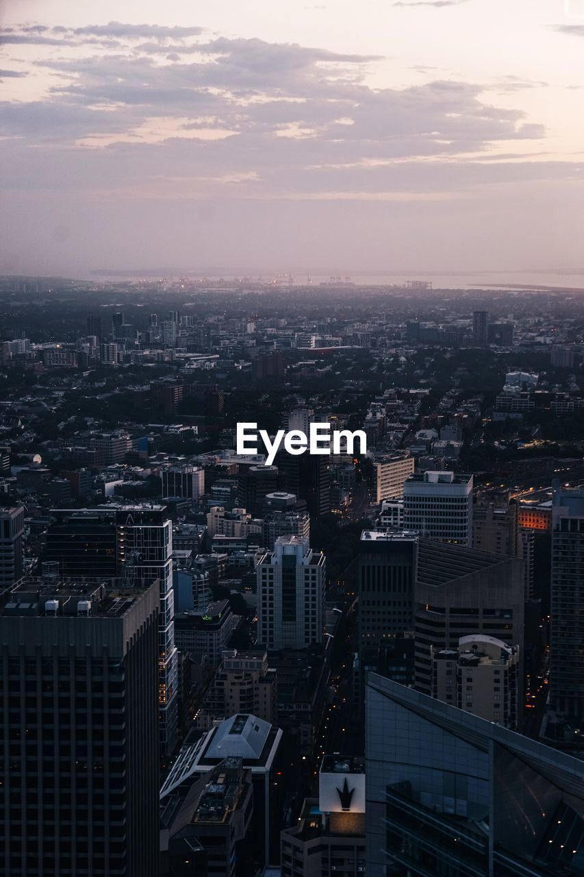 High angle view of buildings against sky during sunset