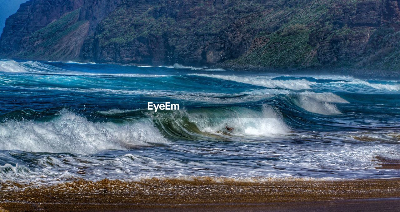SCENIC VIEW OF SEA WAVE