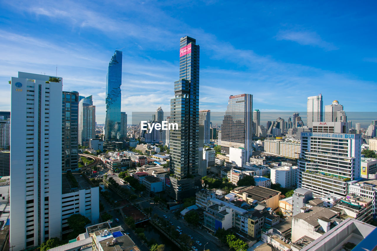 MODERN BUILDINGS AGAINST SKY IN CITY