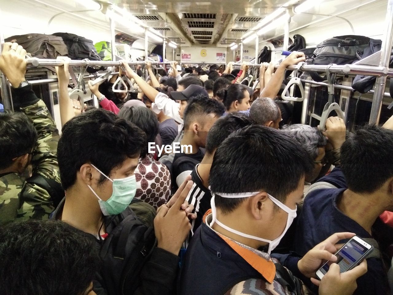 People standing in train