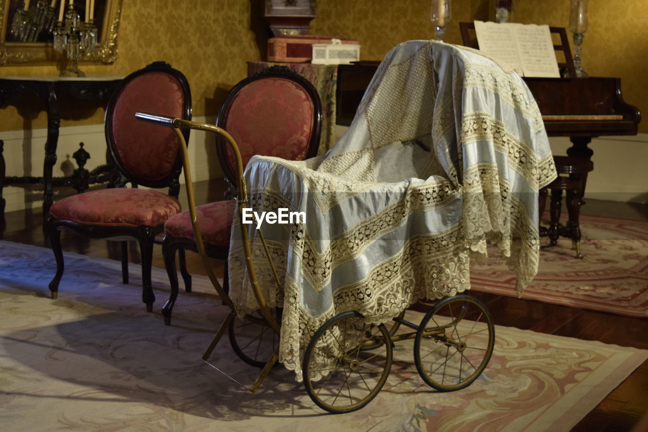 CLOSE-UP OF CHAIR AND TABLE AT HOME