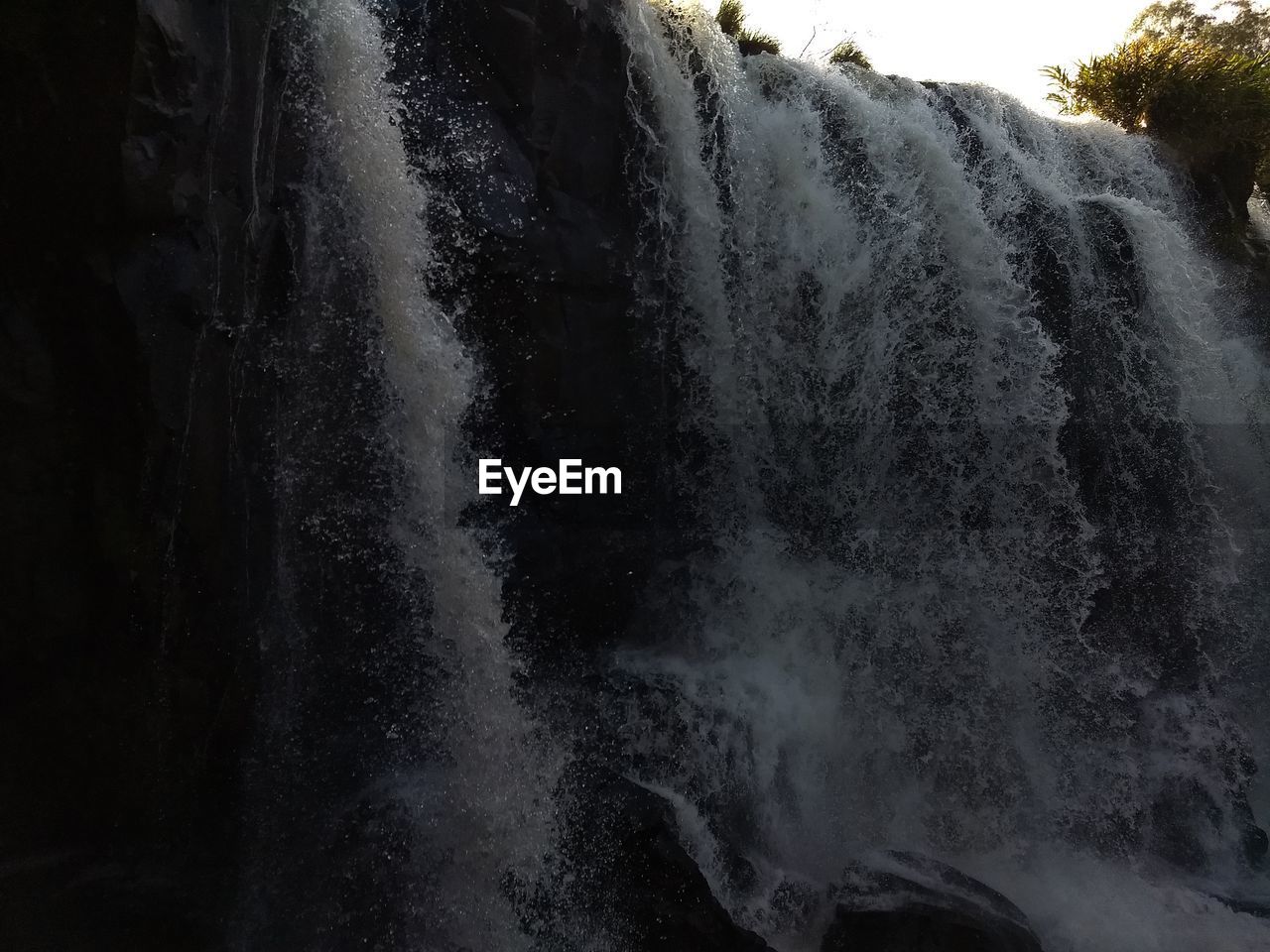 WATER SPLASHING ON WATERFALL