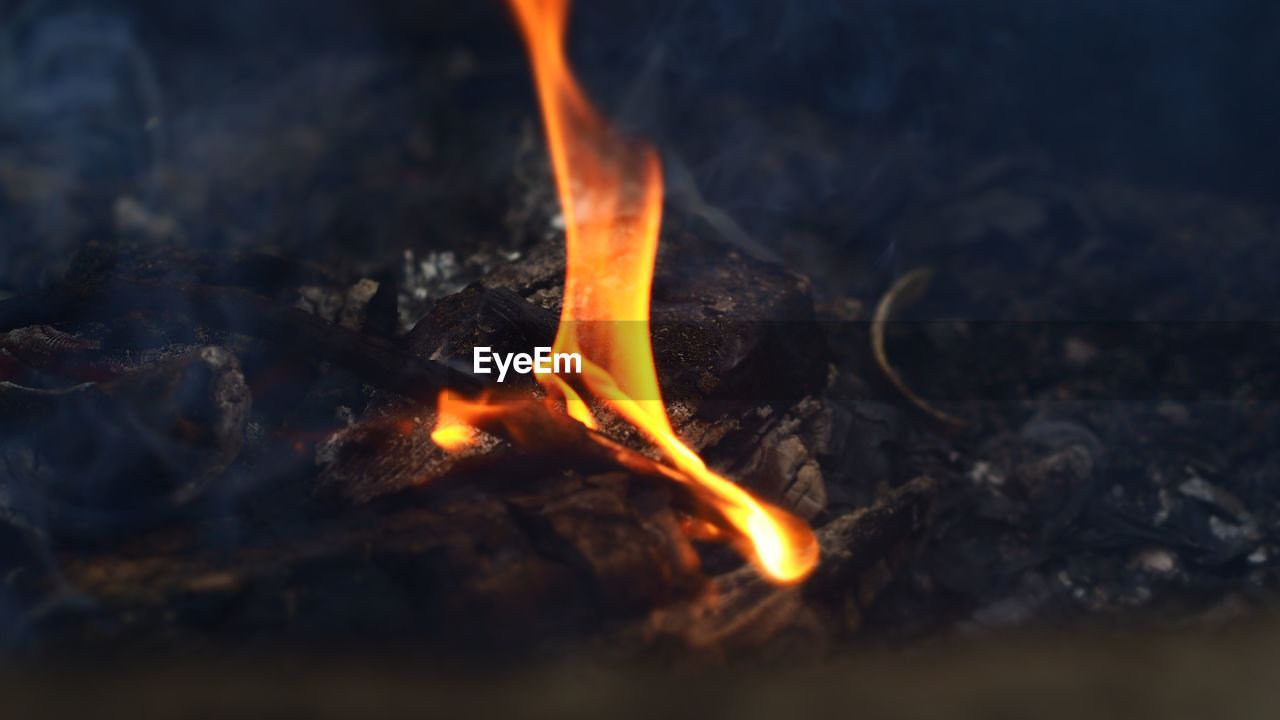 CLOSE-UP OF BURNING FIRE