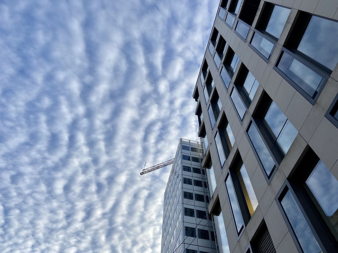 Low angle view of modern building against sky