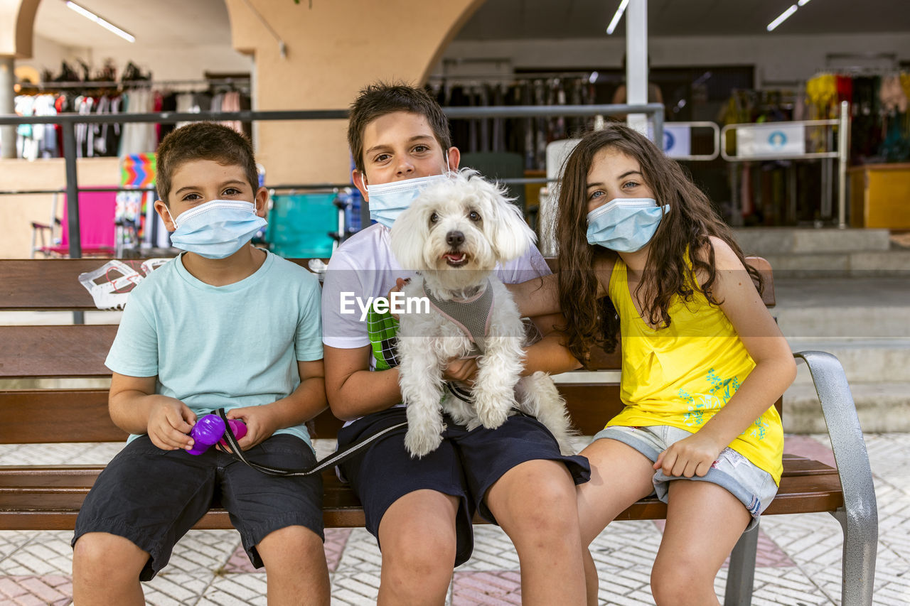 Group of kids with dog