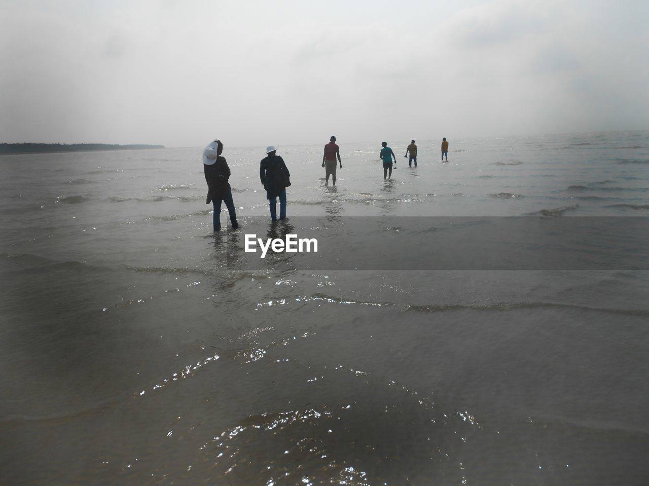VIEW OF PEOPLE ON BEACH