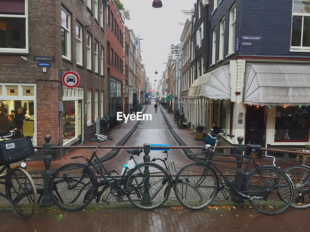 CARS PARKED IN FRONT OF BUILDINGS