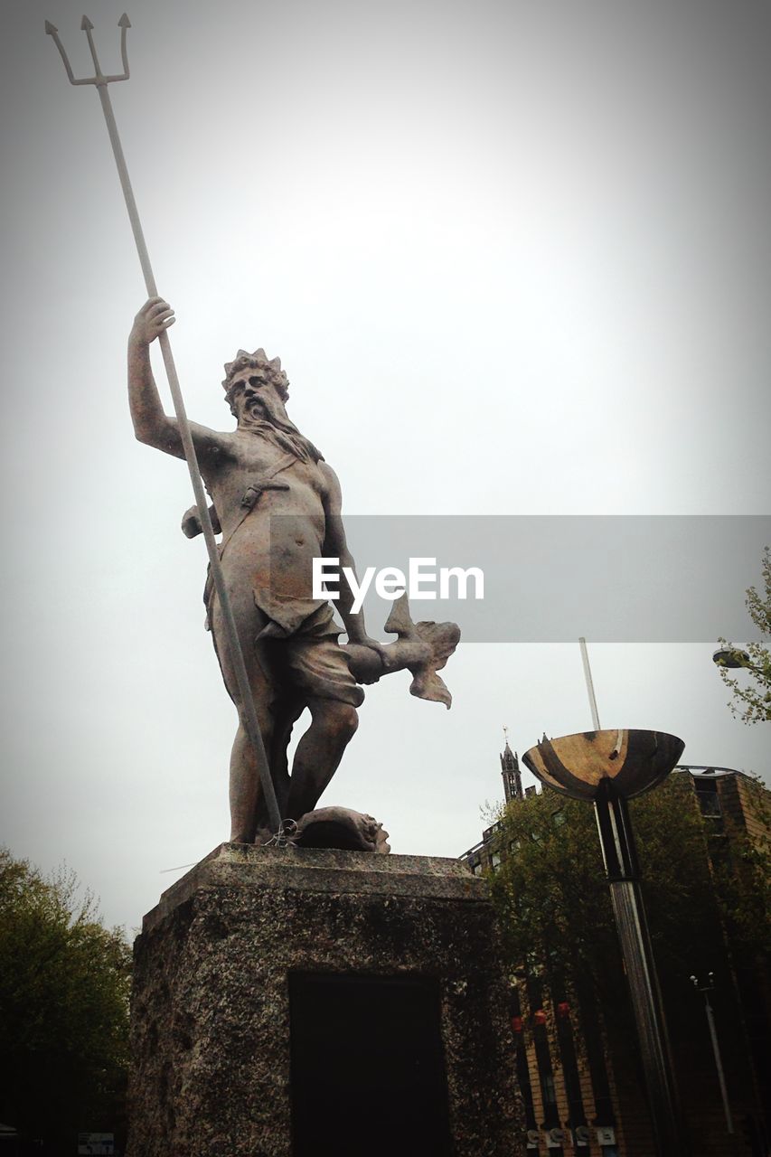 LOW ANGLE VIEW OF STATUES