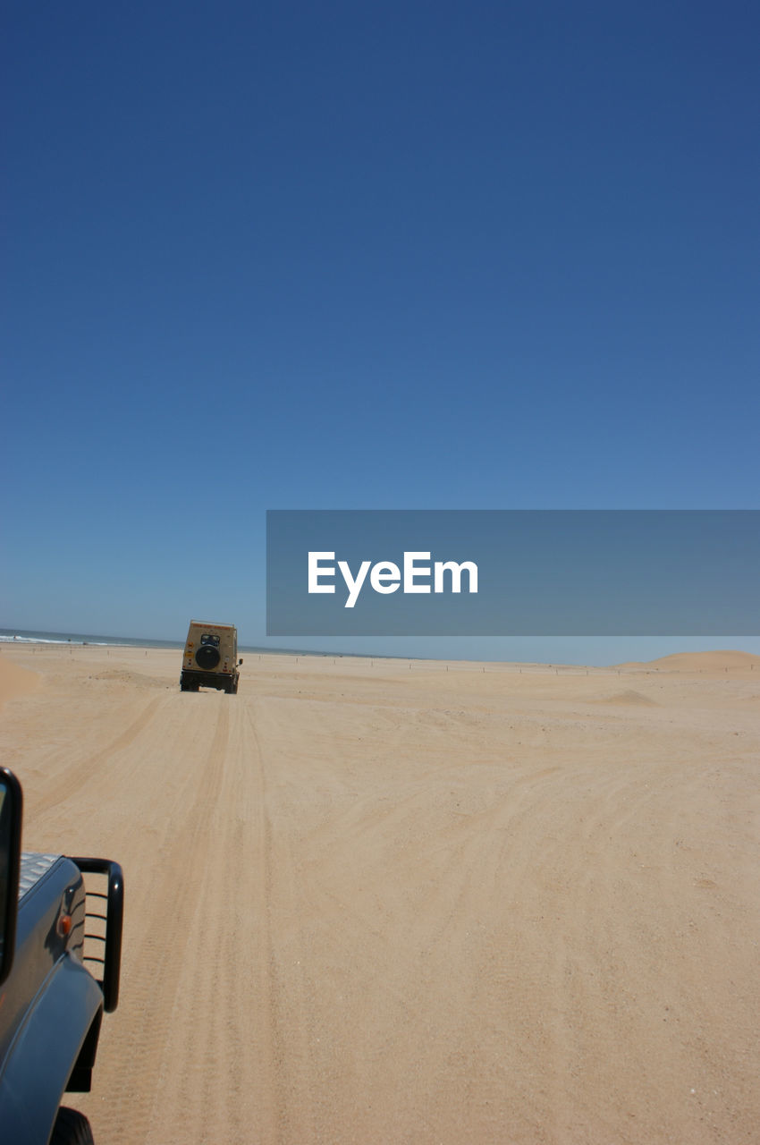 VIEW OF LANDSCAPE AGAINST CLEAR BLUE SKY