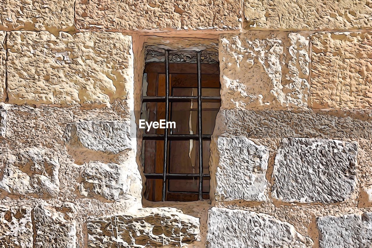 CLOSE-UP OF WINDOW ON HOUSE WALL