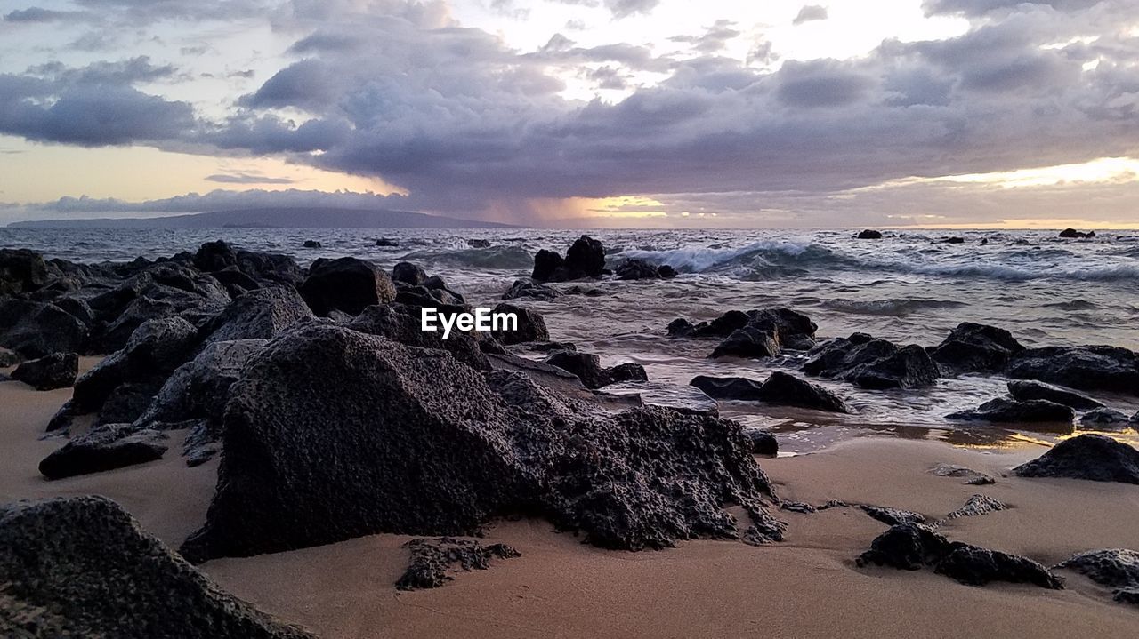 Scenic view of sea against sky during sunset