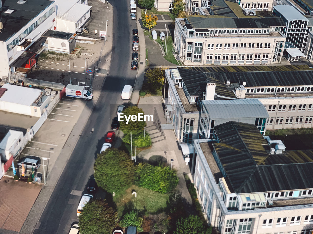 High angle view of street amidst buildings in city