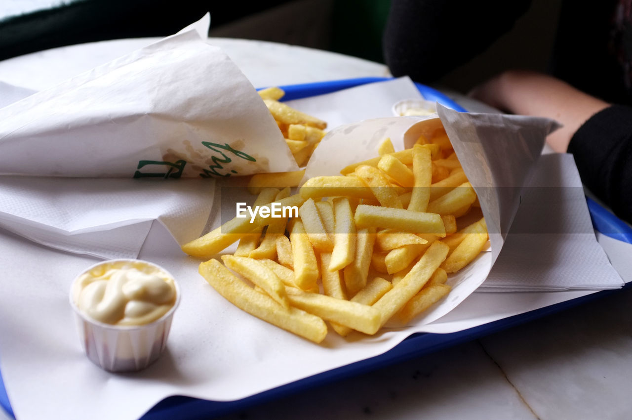 Close-up of french fries with dip