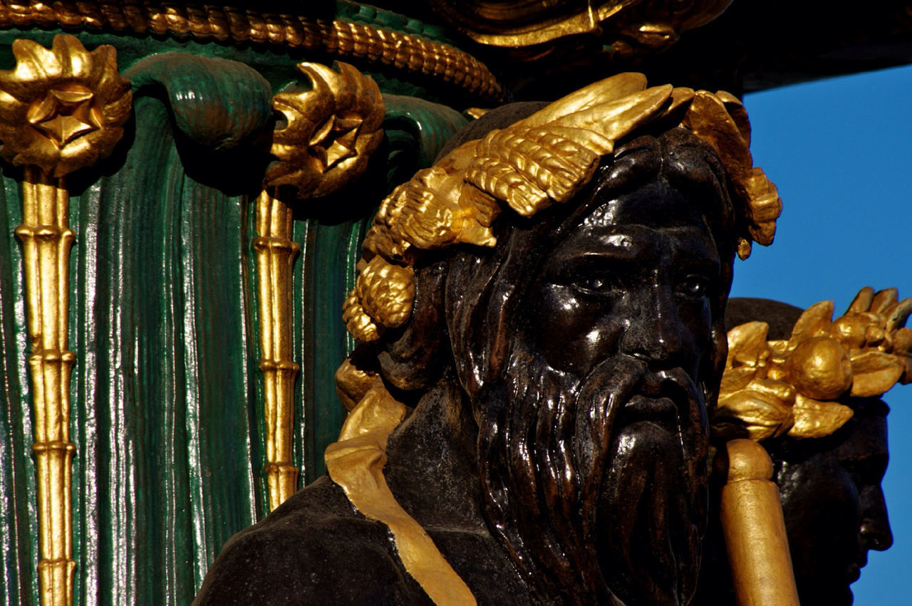 STATUES ON WALL