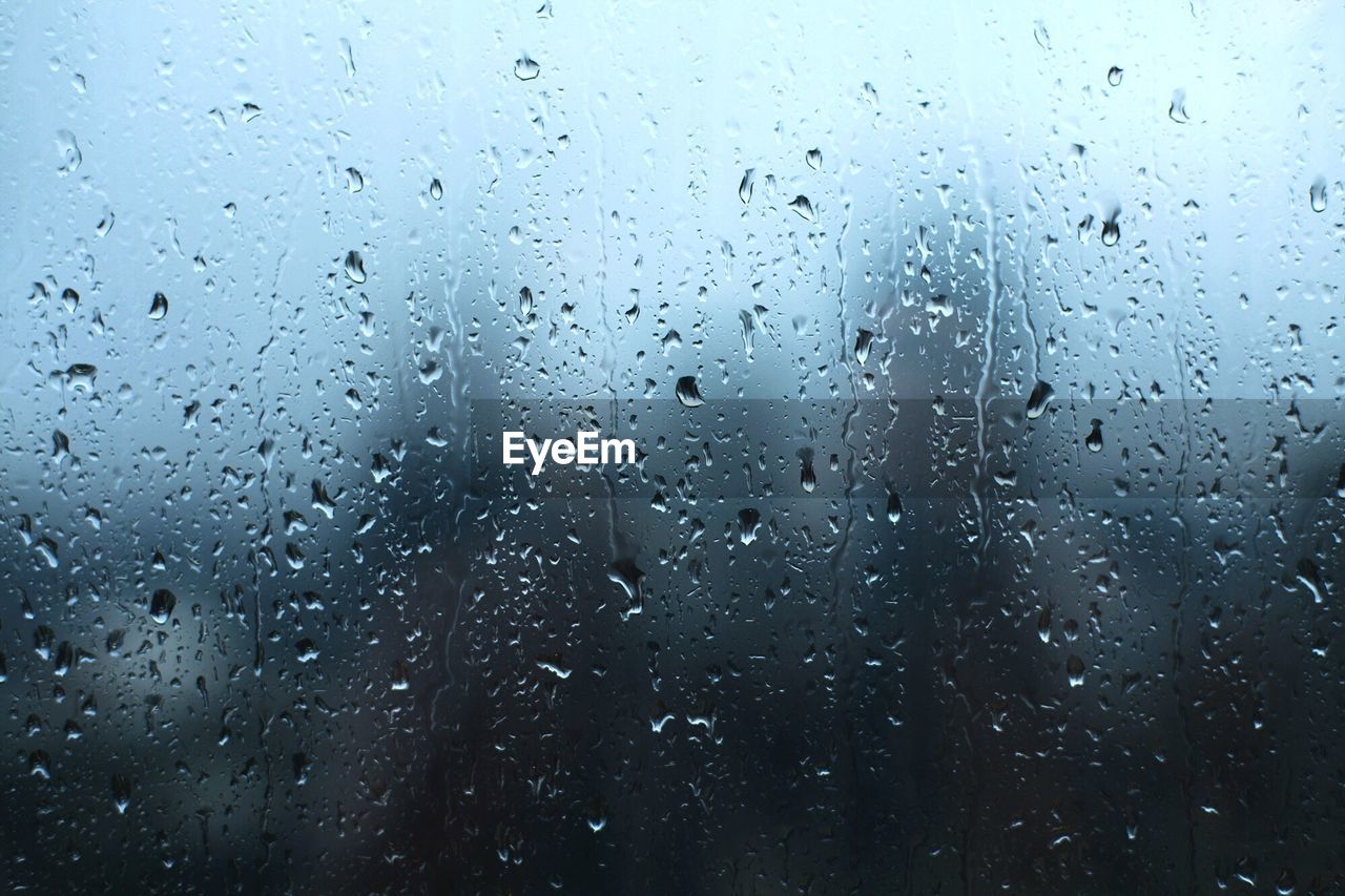 Close-up of water drops on glass