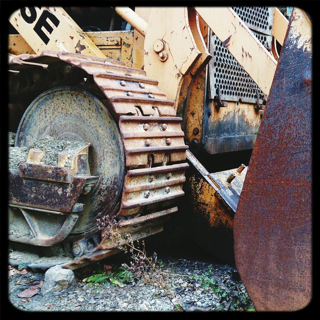 Close-up of rusty agricultural machinery