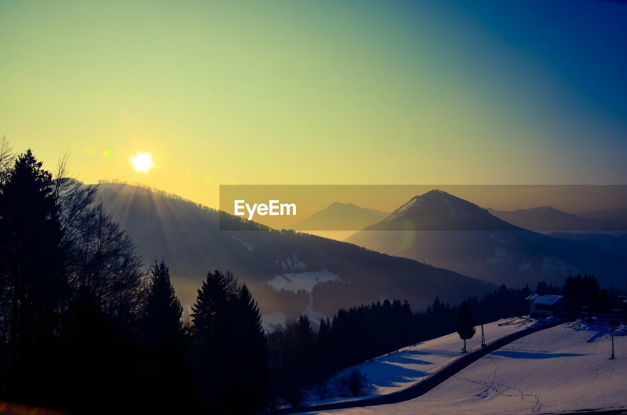 Scenic view of mountains during sunset