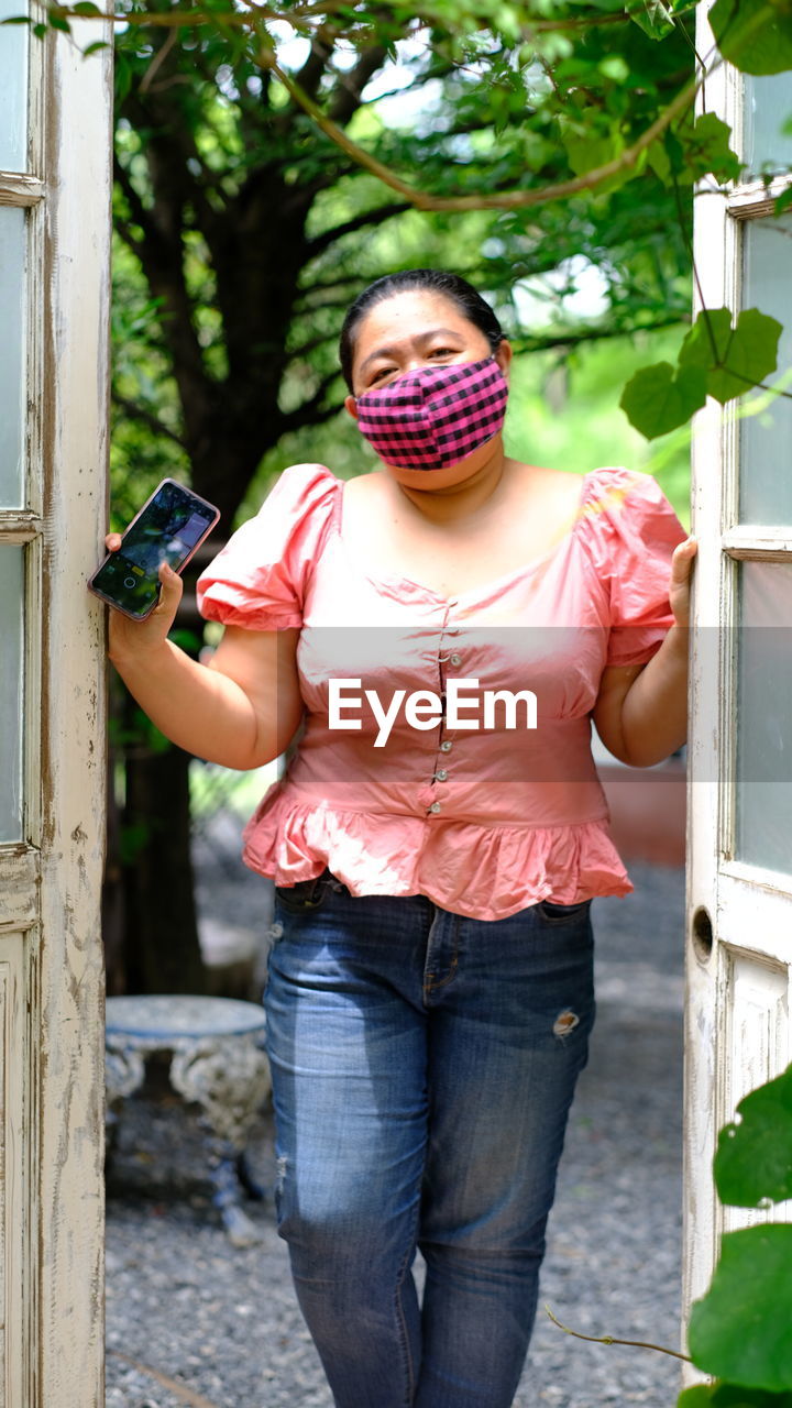 Portrait of woman wearing mask