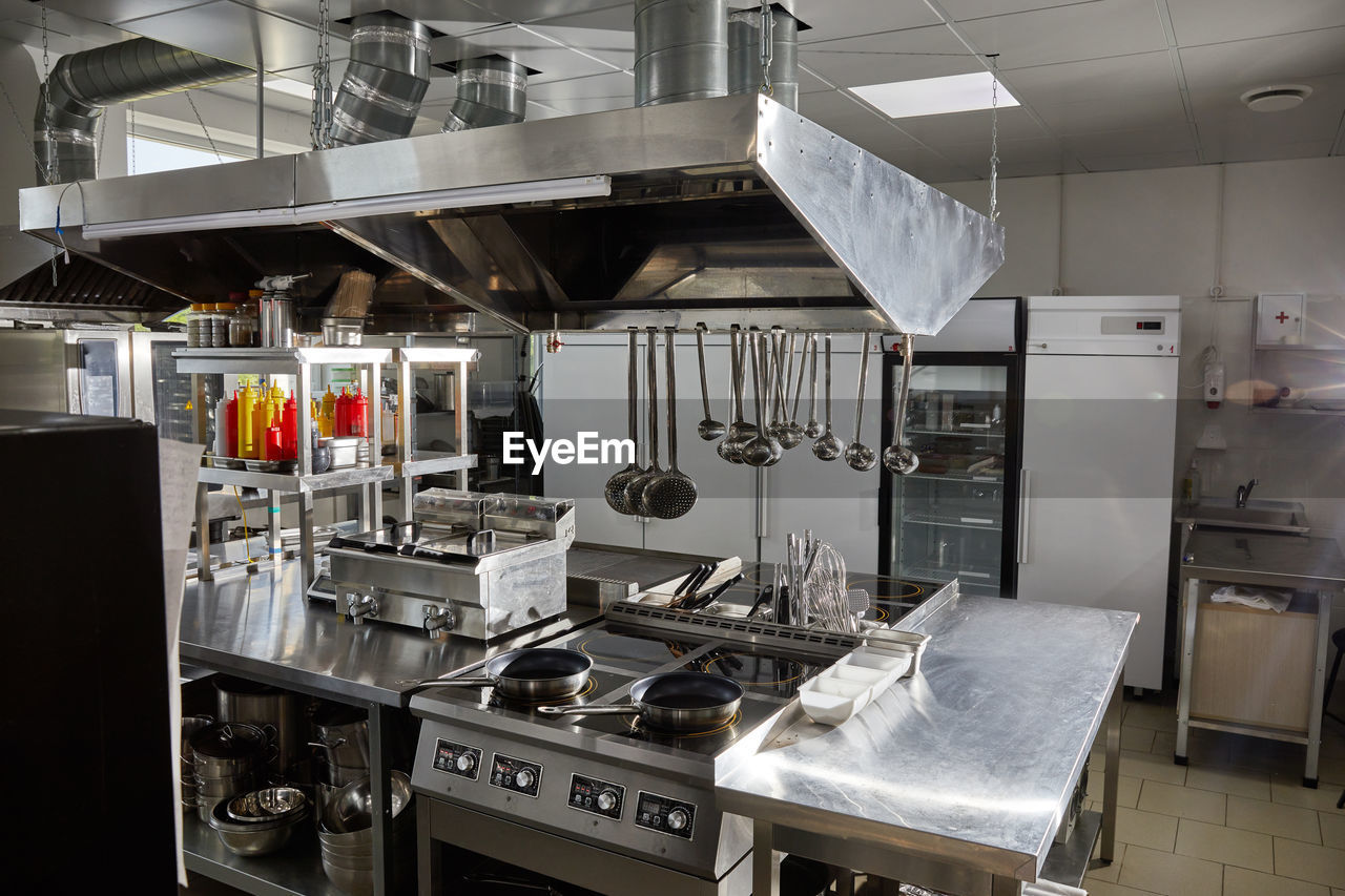 VIEW OF MACHINE IN KITCHEN