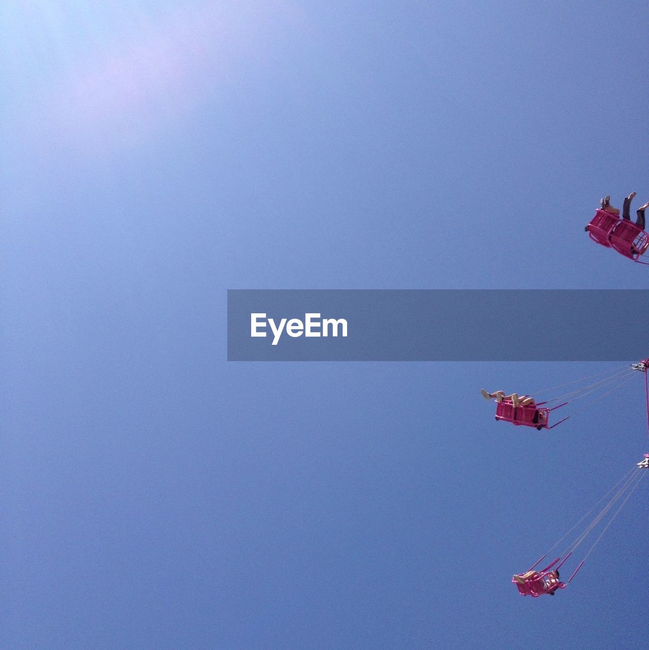 LOW ANGLE VIEW OF TREES AGAINST CLEAR BLUE SKY