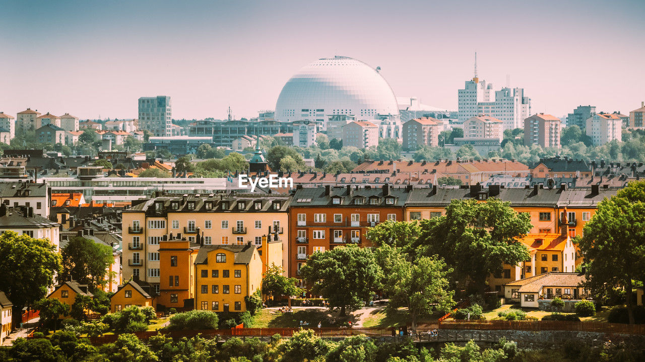 buildings in city against sky