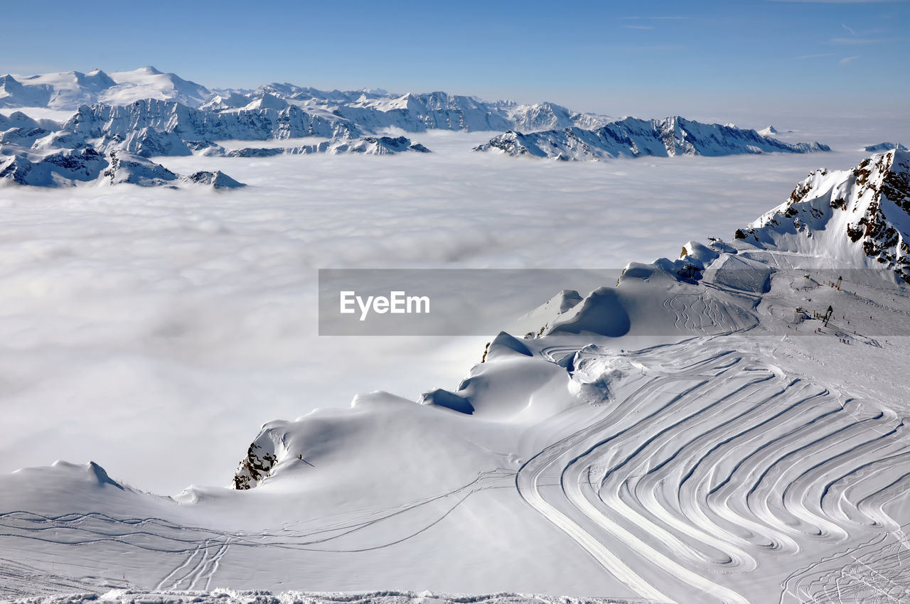 Ski resort in the alps. ski slopes, piste, powder snow in the mountains