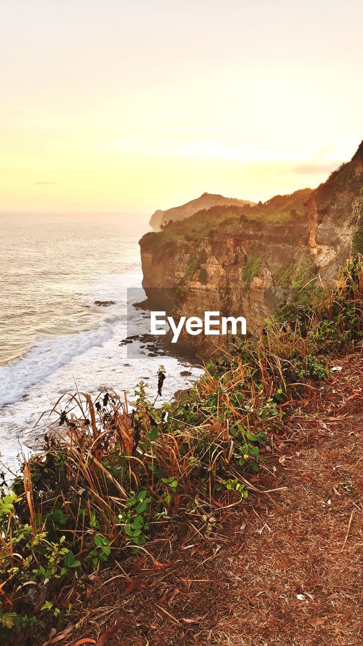 Scenic view of sea against sky during sunset