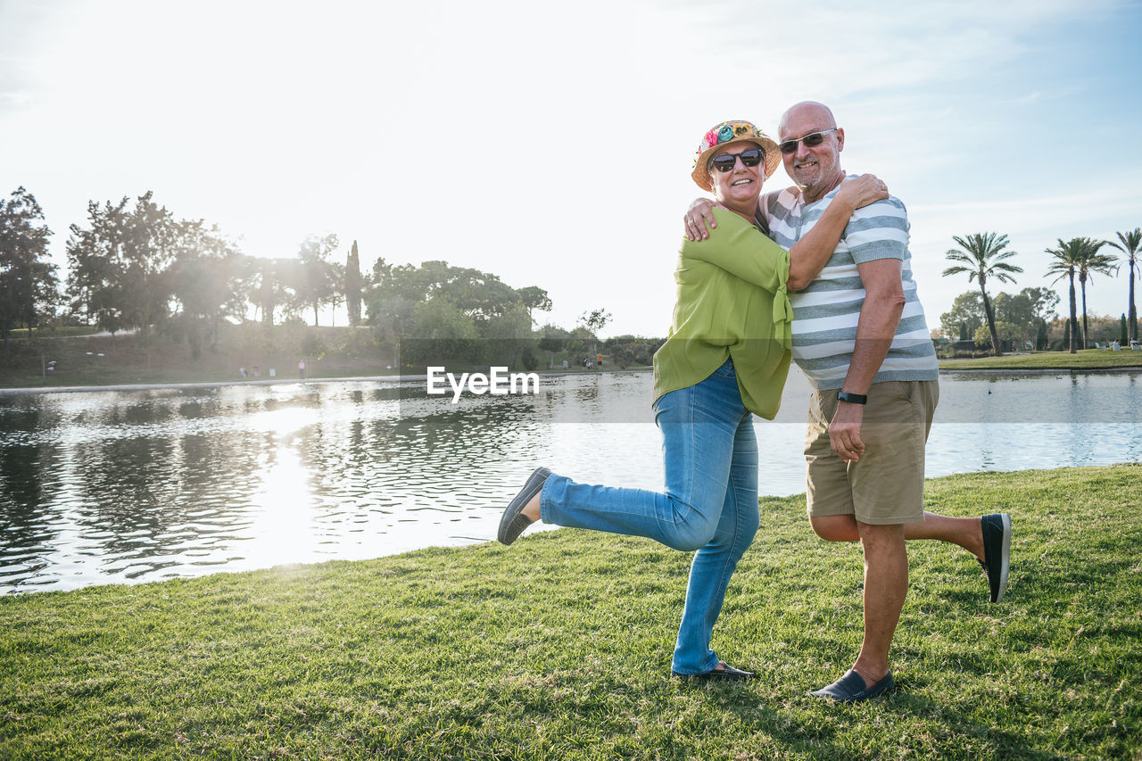 Smiling retired couple in a park