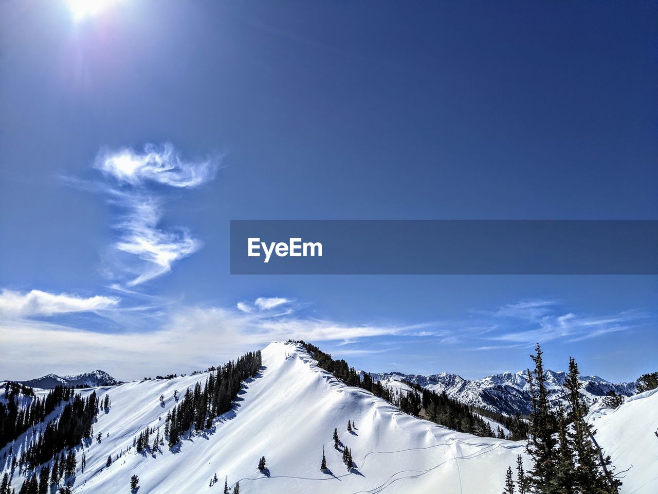 SNOWCAPPED MOUNTAINS AGAINST SKY