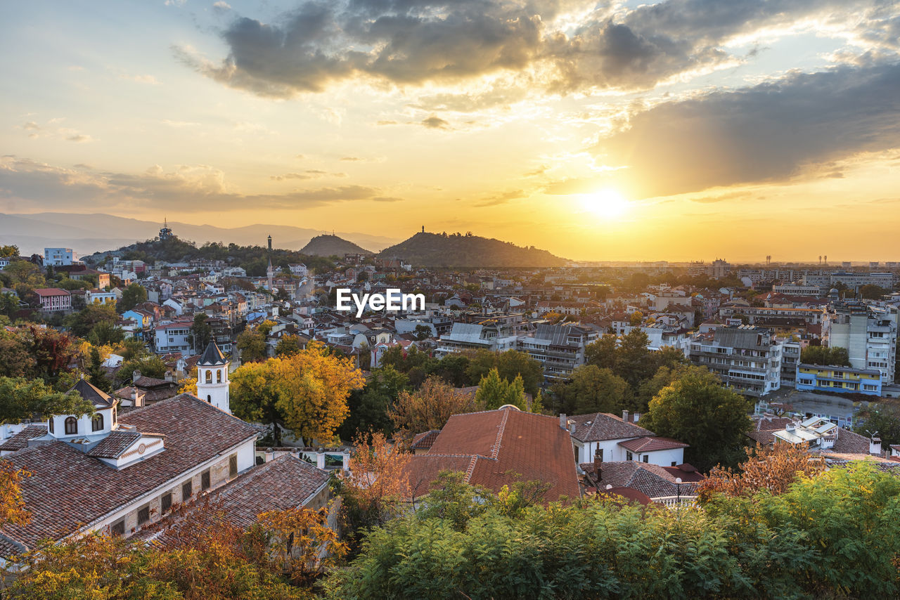 High angle view of townscape against sky during sunset