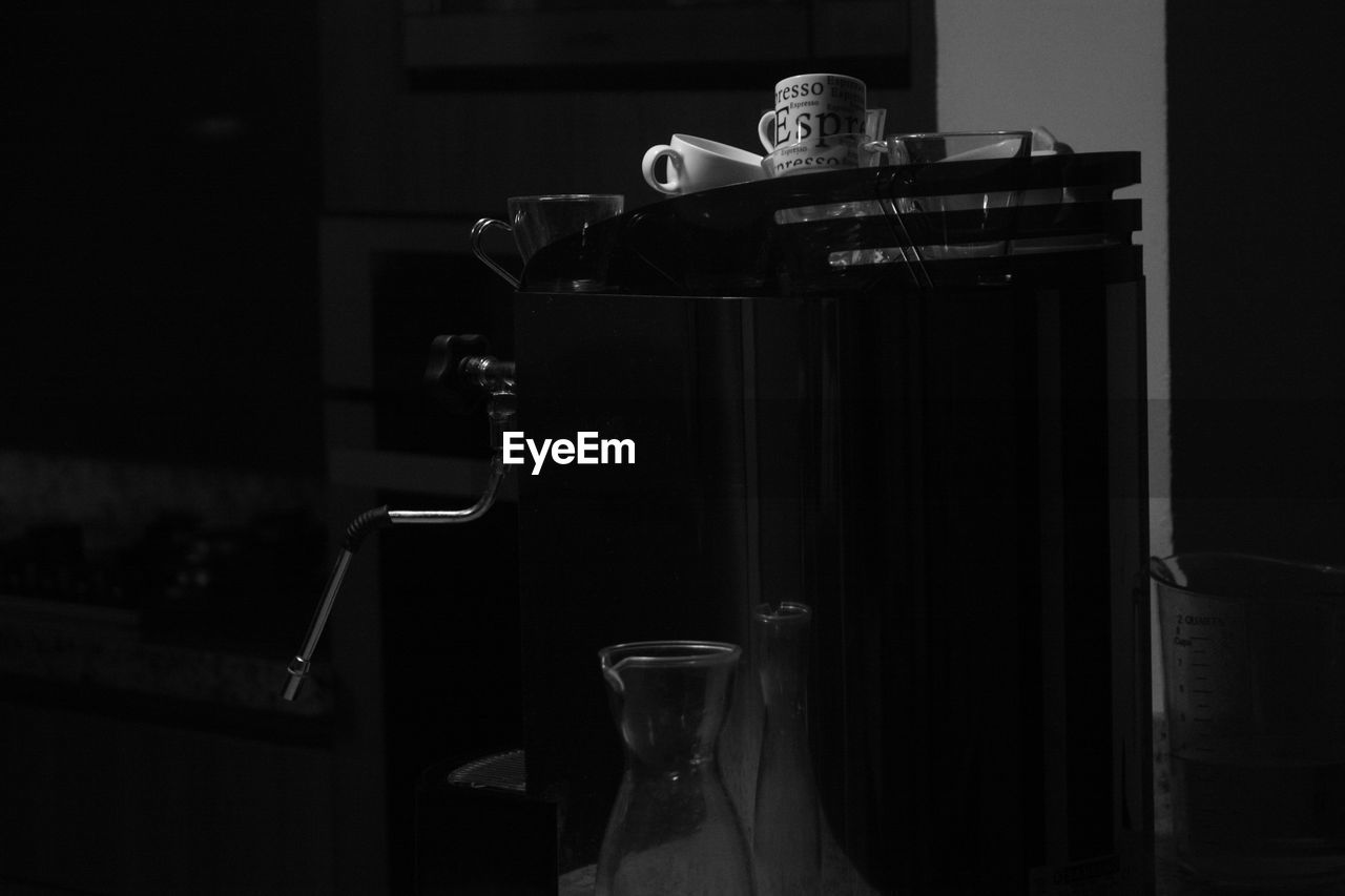 CLOSE-UP OF COFFEE CUP ON TABLE