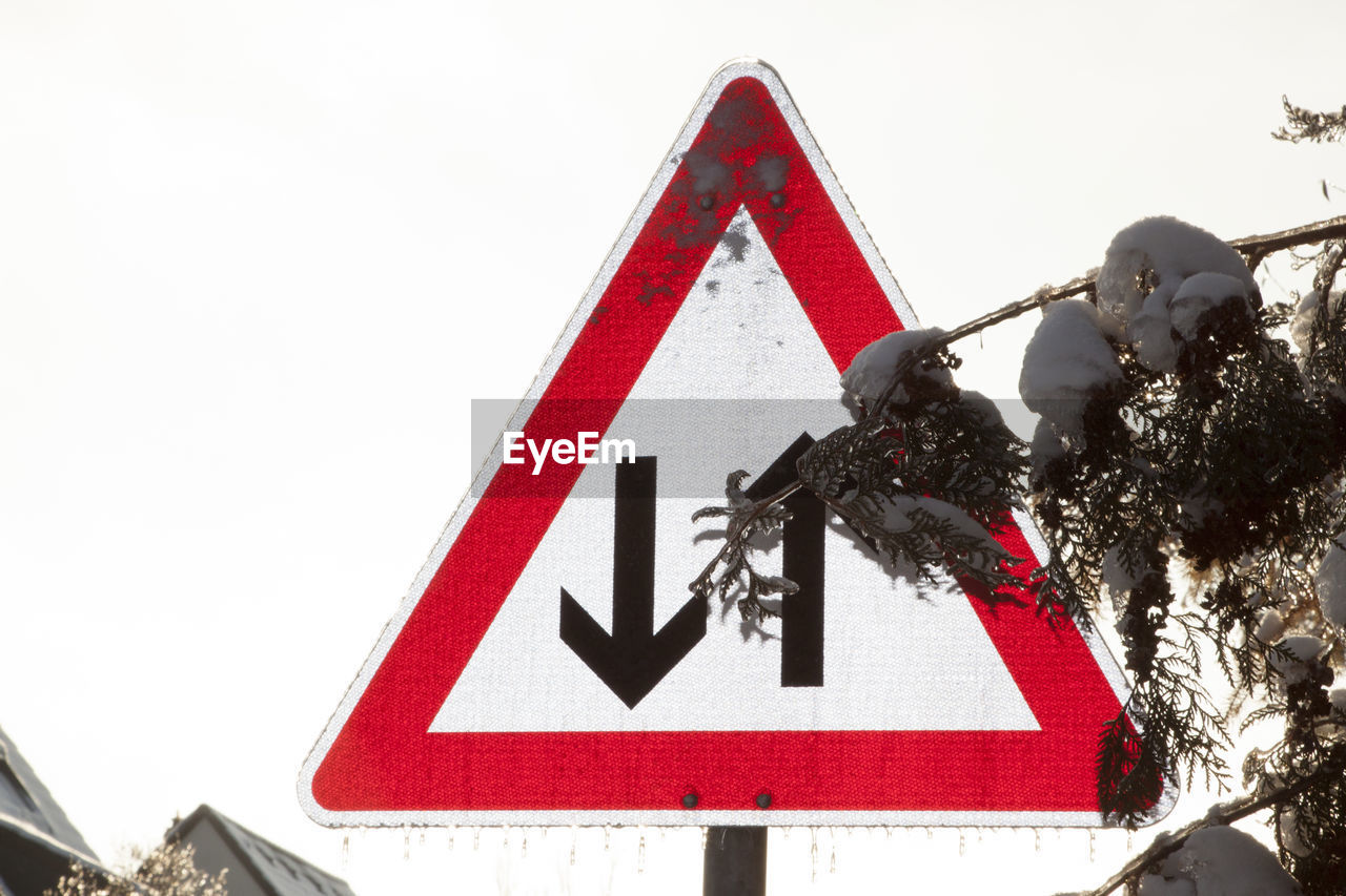 LOW ANGLE VIEW OF ROAD SIGNS