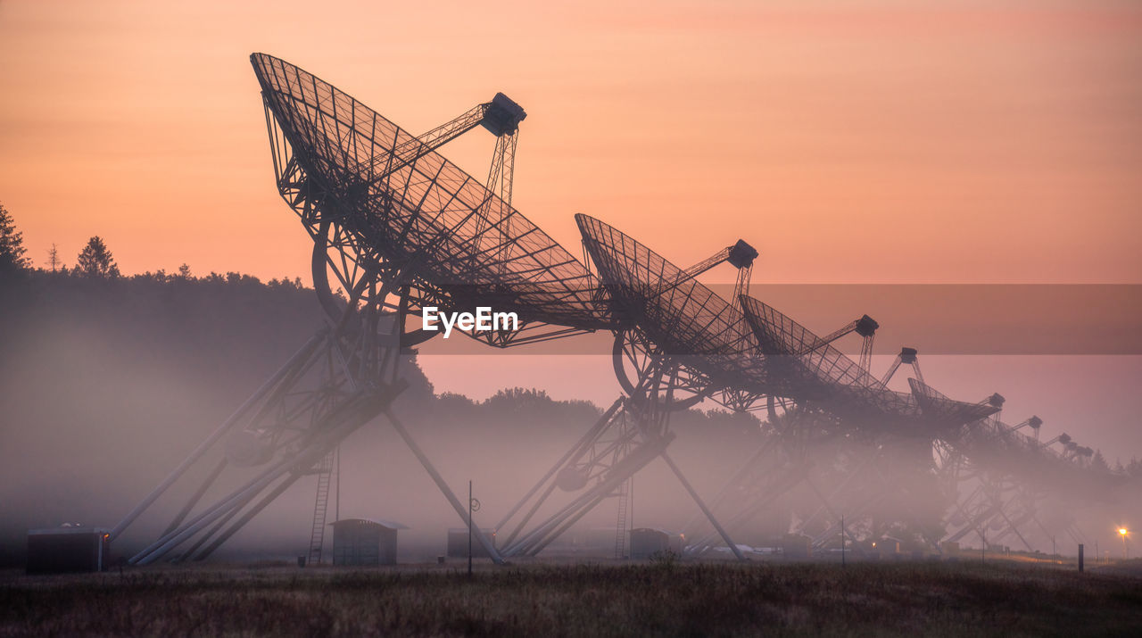 Satellite radio station in the netherlands at sunrise 