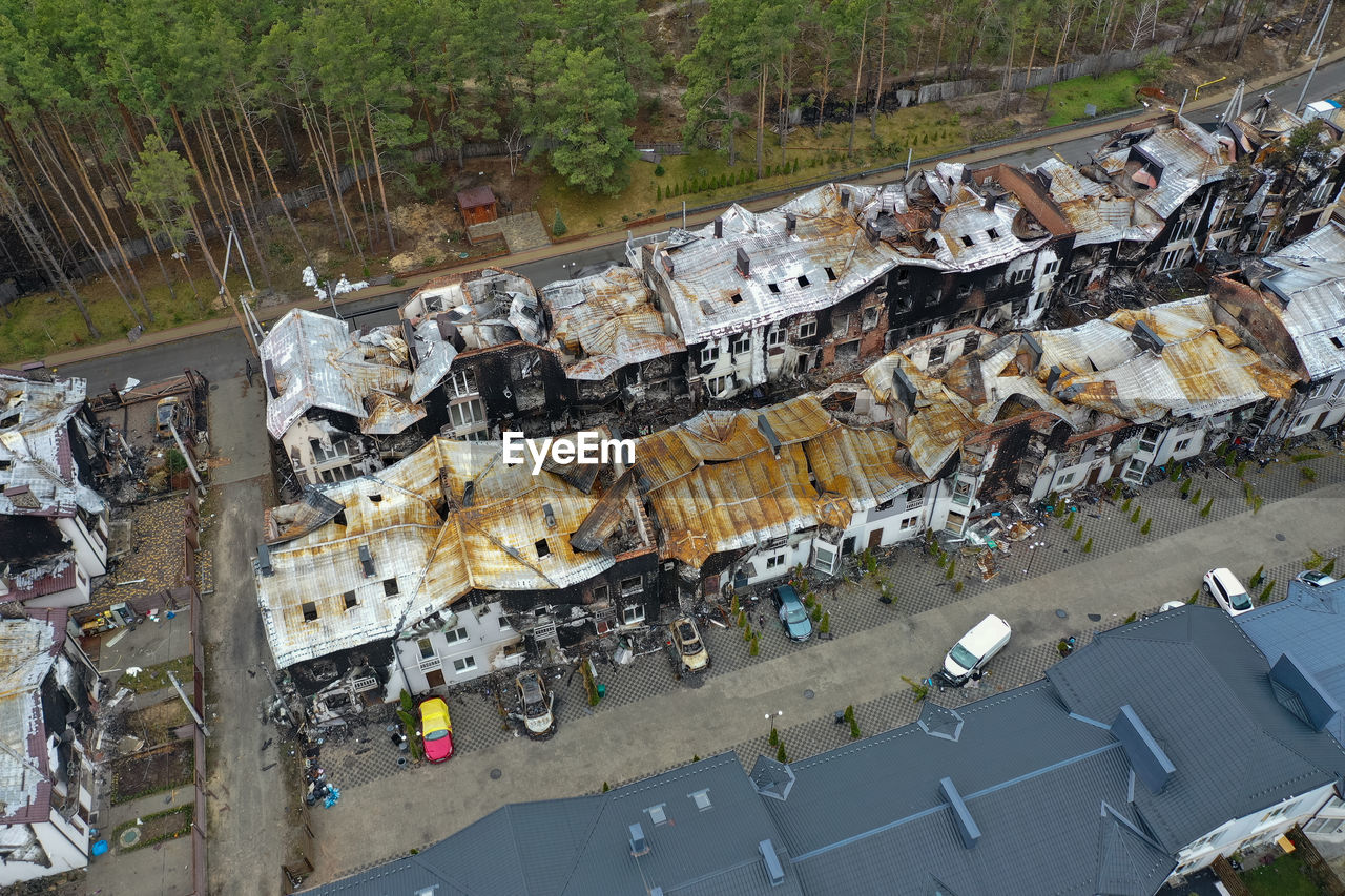 Top view of the destroyed and burnt houses. houses were destroyed by rockets from russian soldiers.